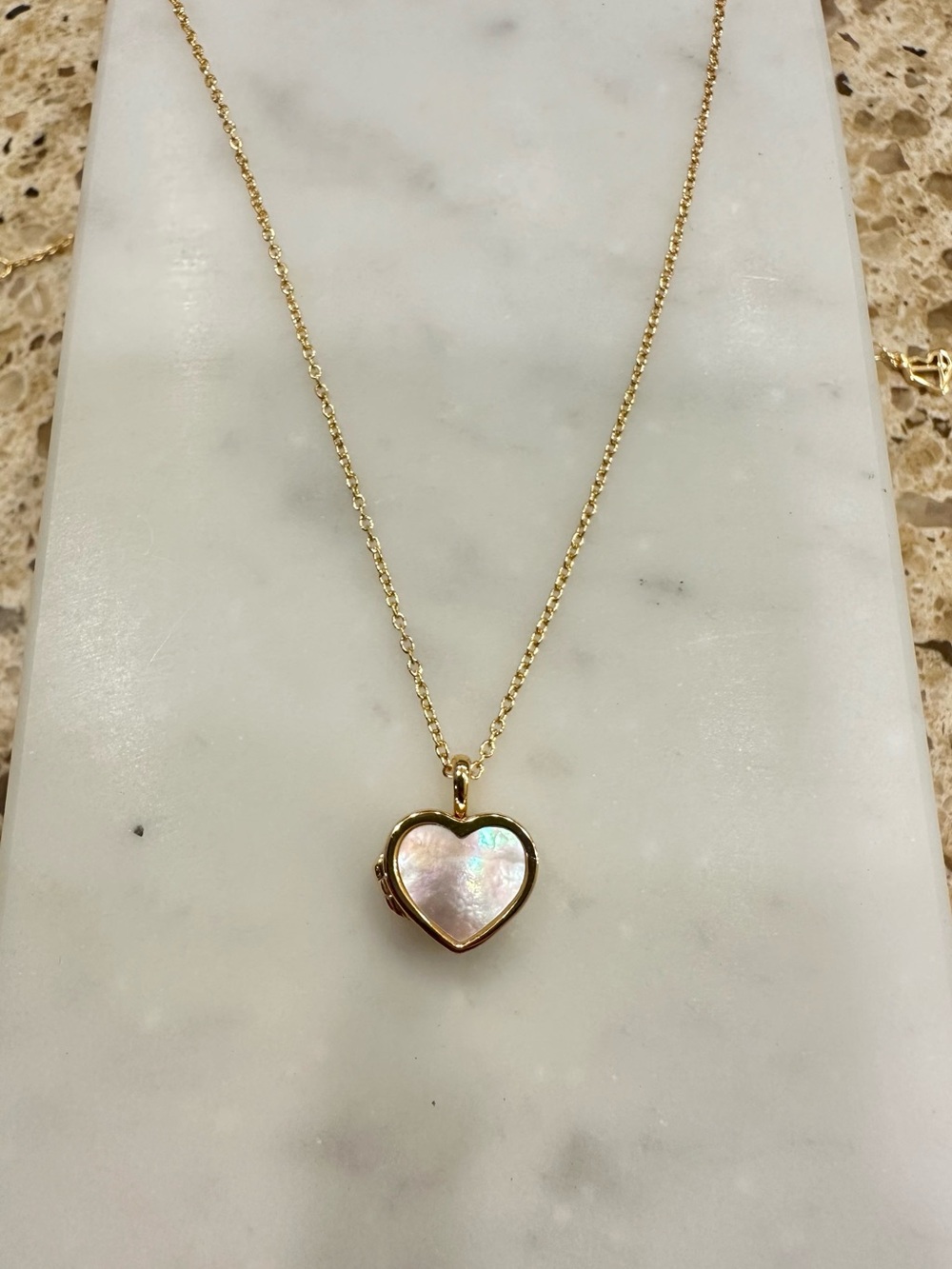 Mother of pearl heart locket necklace